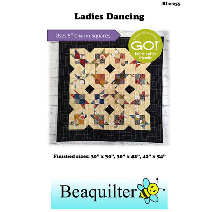 Charming quilt showcases a beautiful patchwork design with note about this pattern being Accuquilt GO! fabric cutter friendly and that it uses 5-inch charm squares.