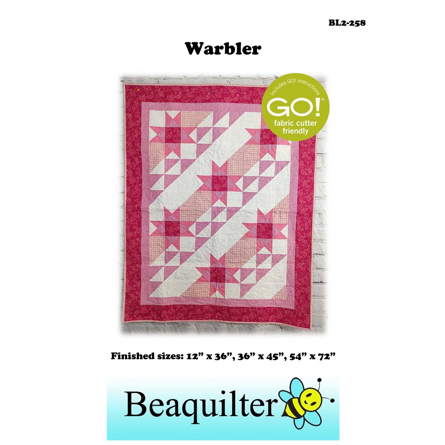 Beautiful quilt in pinks and white fabric with stars and diagnal rows of white, pinks and white and pink triangles.