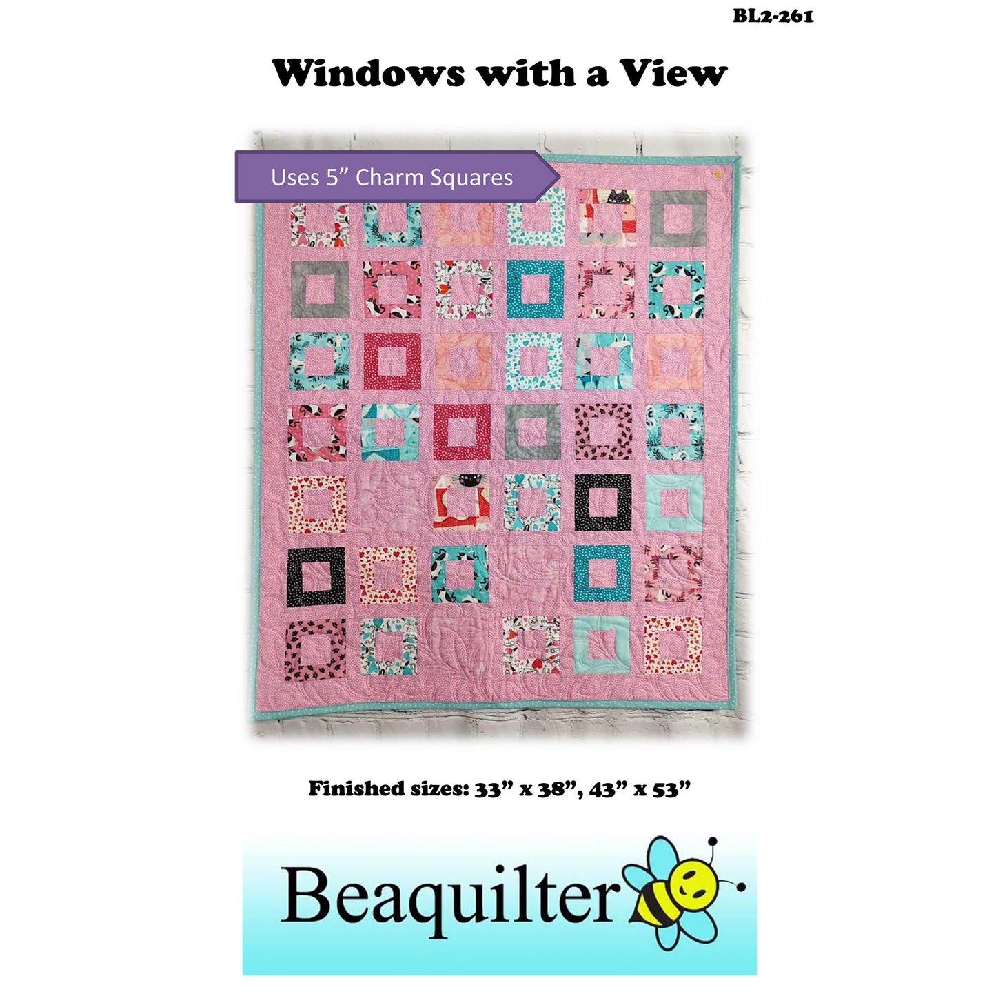 Colorful quilt in pink with rows and columns of frames in different colors.