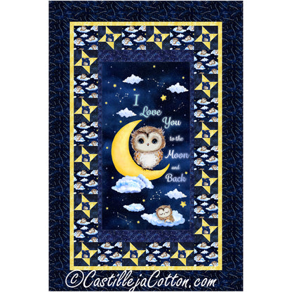 An owl and moon quilt with clouds and stars, showcasing a cozy and whimsical design.