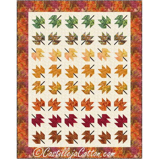 Autumn-themed quilt showcasing vibrant leaves in various shades, creating a cozy and warm ambiance.