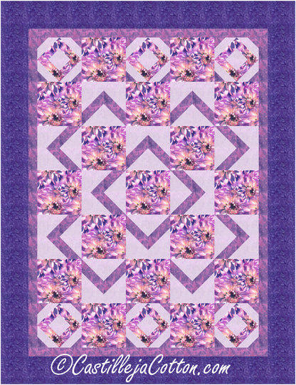 A vibrant quilt pattern with a square pattern in shades of purple and pink.