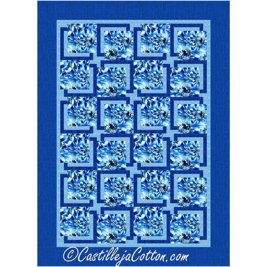 A stunning quilt featuring a combination of blue and white colors, embellished with lovely blue and white flowers.