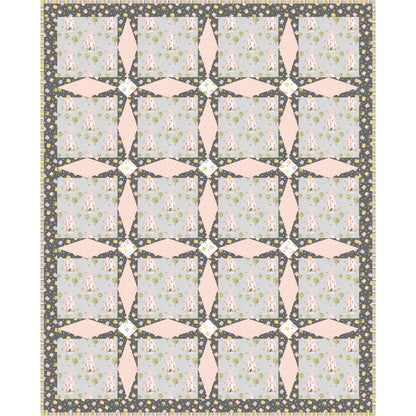 A quilt with alternating pink and gray squares, showcasing a beautiful blend of colors and patterns.