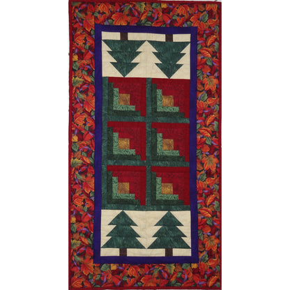 Quilted table runner with log cabin and evergreen tree blocks