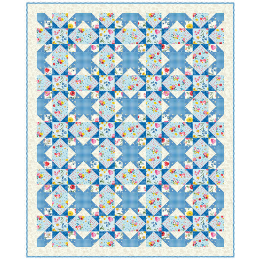A vibrant quilt with a colorful design, featuring shades of blue and white, adds a cozy touch to any space.