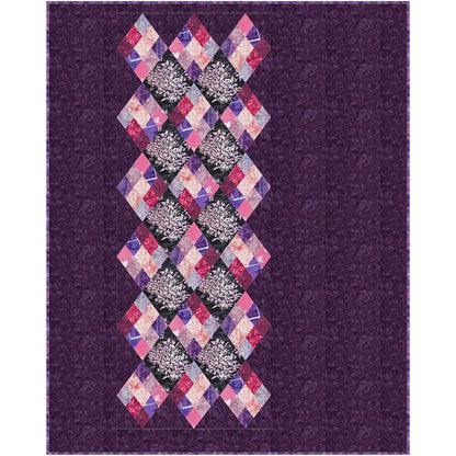 Colorful quilt with purple and pink diamond pattern on a purple background.