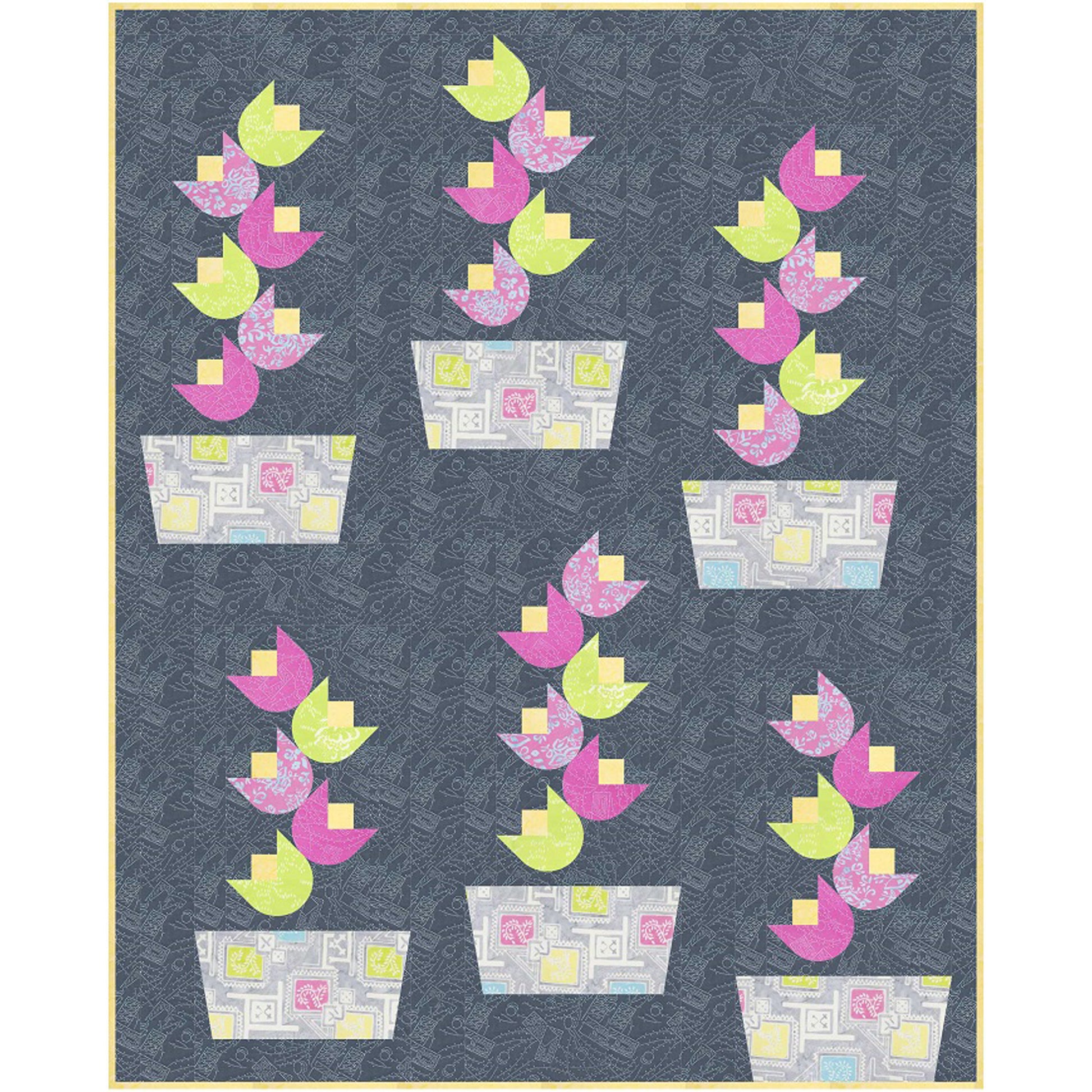 A quilt hanging of pink, yellow and green flowers in a fun gray, pink, yellow, and green pot designed fabric and a gray designed fabric background.