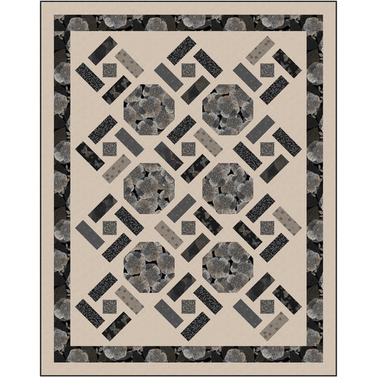A quilt showcasing a pattern of black and gray hexagons and blocks created by strips of color and a diamond in the middle, adding depth and sophistication to the overall design. Background color is tan.