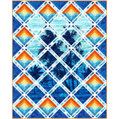 Serene quilt showcasing palm trees against a serene blue sky cut up so looks like seen through diamond panes with sunset log cabin blocks on the sides. In shades of blue with orange yellow for sunset look on log cabin blocks.